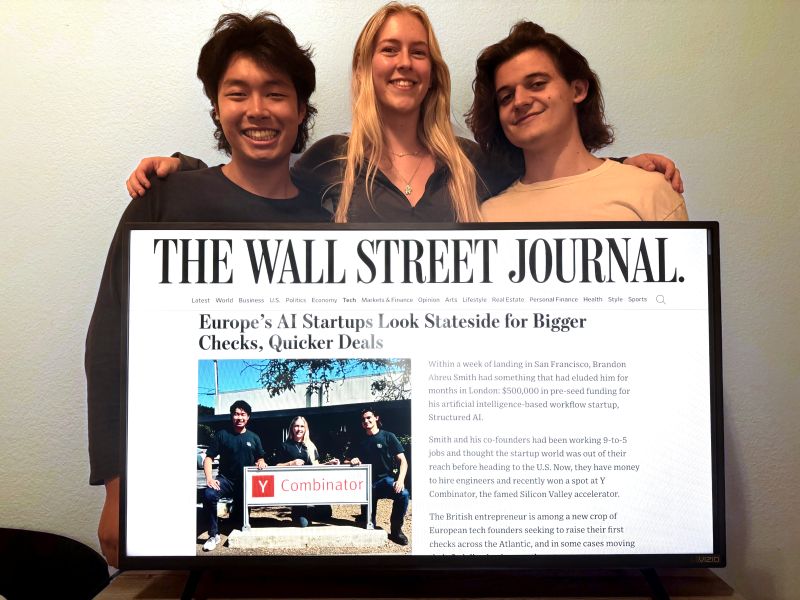 Structured AI founders Raymond Zhao, Isabel Greenslade, and Brandon Abreu Smith with their Wall Street Journal feature on screen